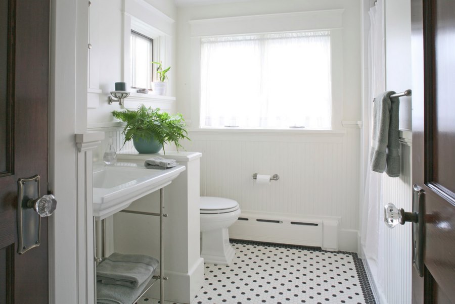 Refreshing white bathroom with beadboard paneling