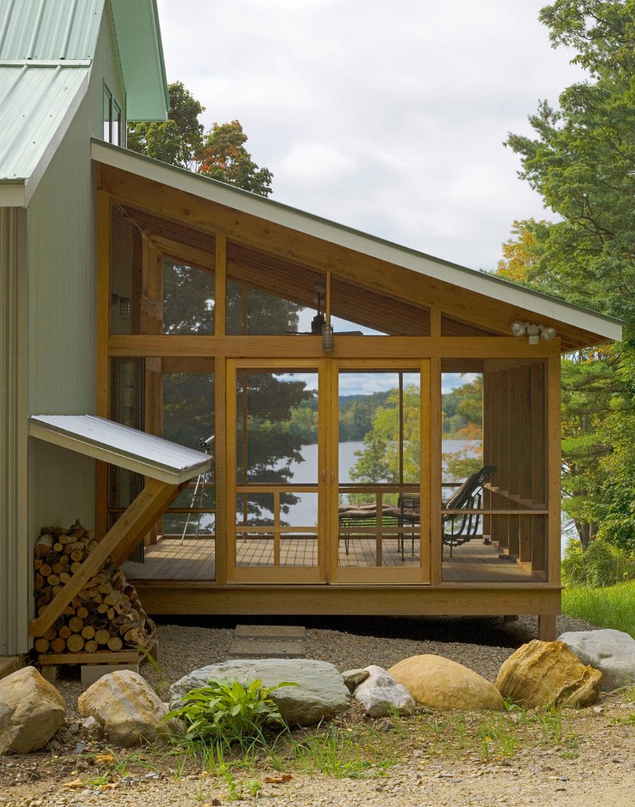 Screened-in lake house porch with a view