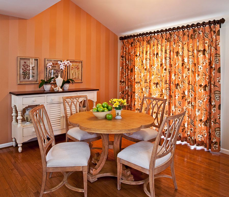 Small dining room with a warm, inviting ambiance [Design: d'avignon interiors]