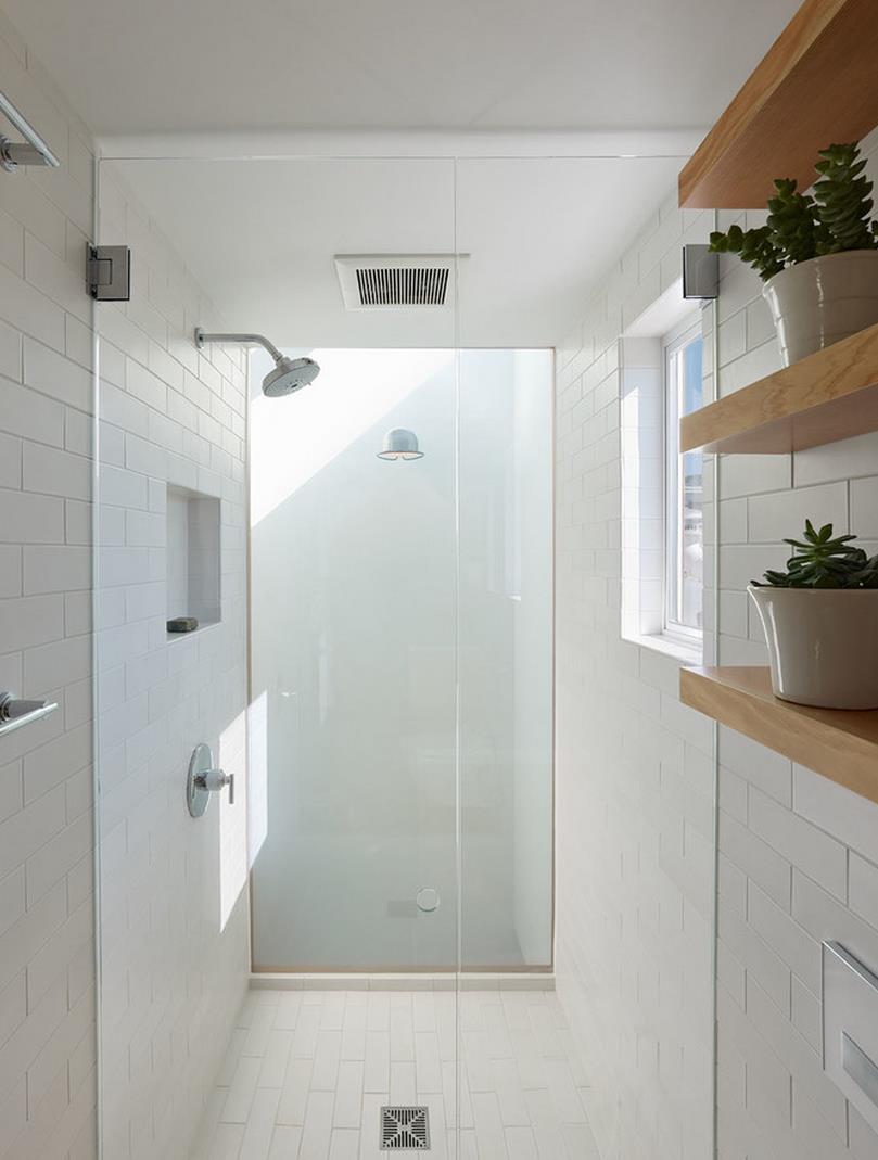 Sparkling white shower with glass doors