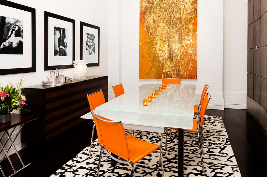 Stunning use of orange and gold in the dining room