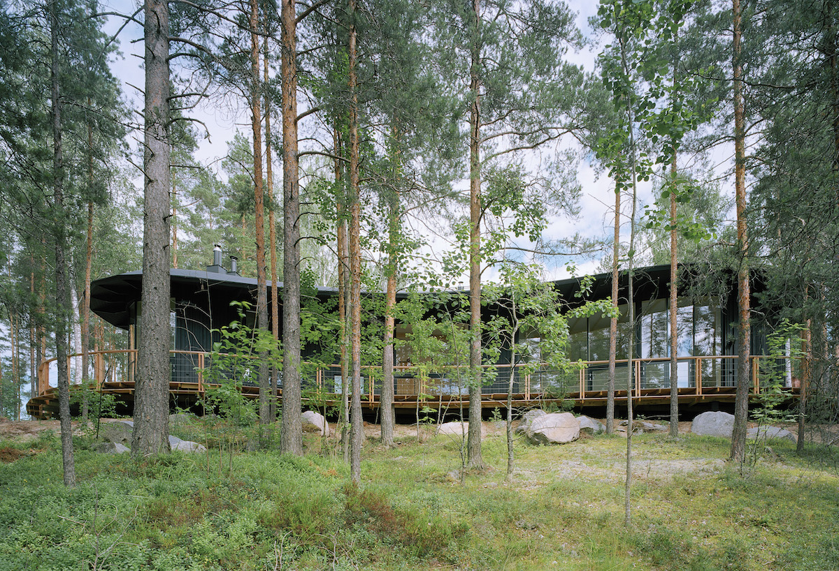 Flowing exterior of Villa Musu draped in greenery