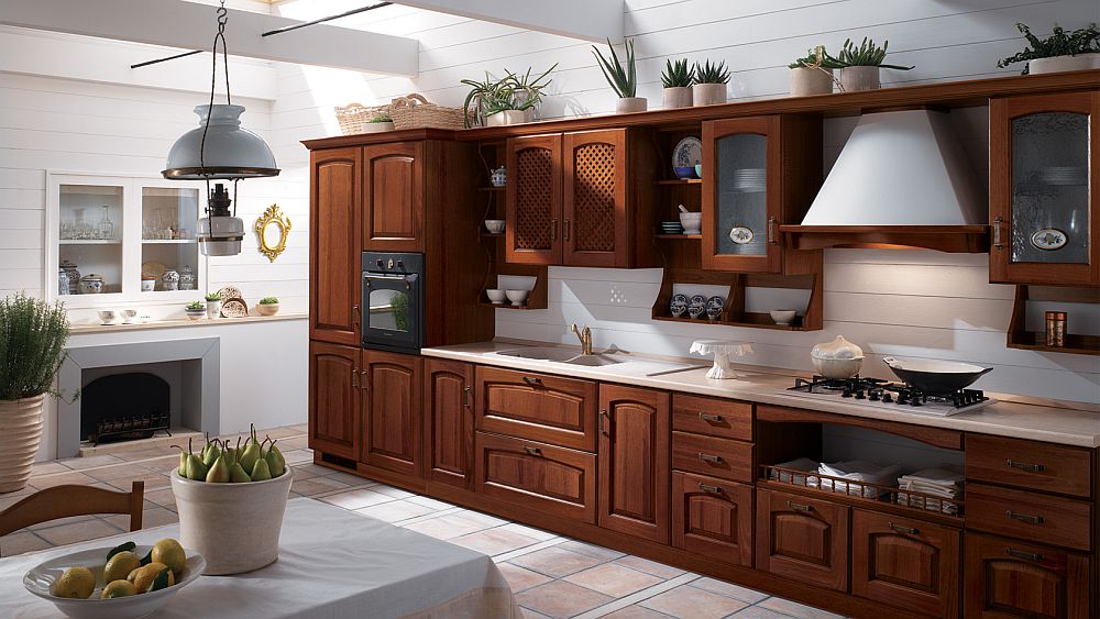 Walnut version of the Madeleine kitchen with its smart, space-saving shelves