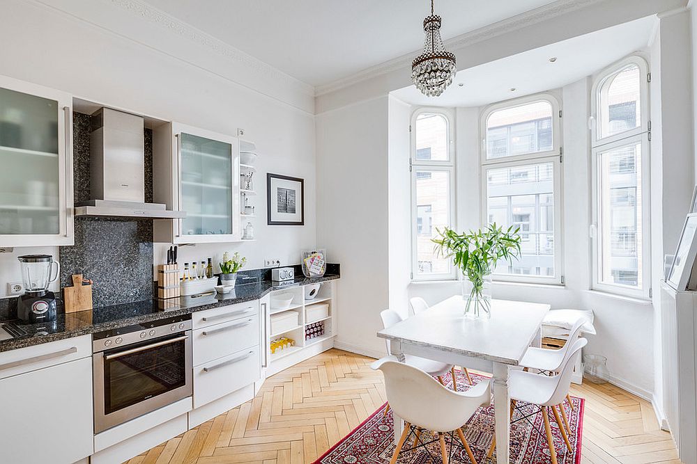 White Scandinavian kitchen with a flood of natural light and herringbone floor