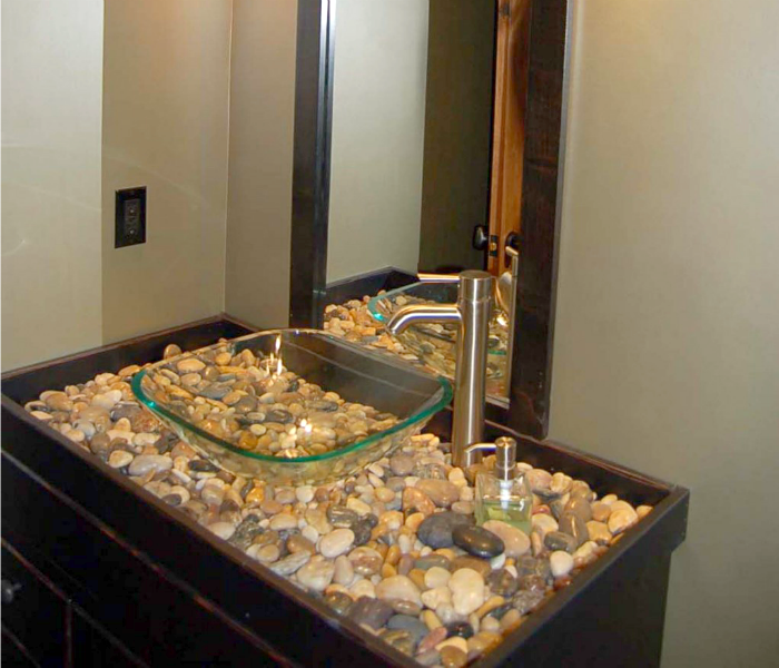 Stylish use of pebbles and rivers tones for DIY vanity