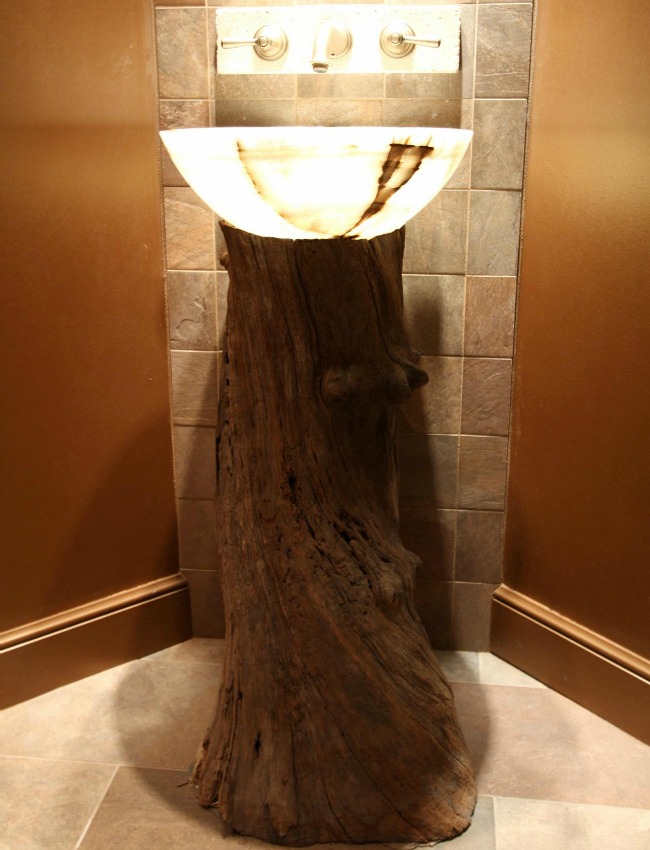 Gorgeous tree trunk bathroom vanity design with smart lighting
