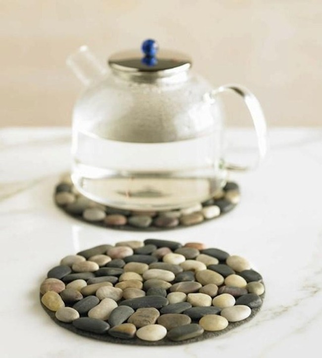 Stones glued to a CD to use as a place mat