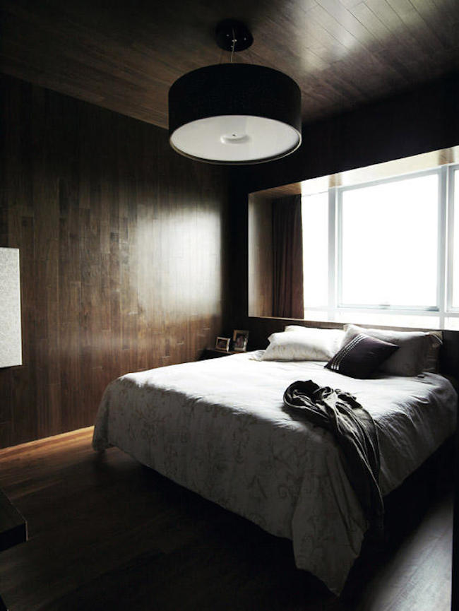 Stylish bedroom with a dark ambiance