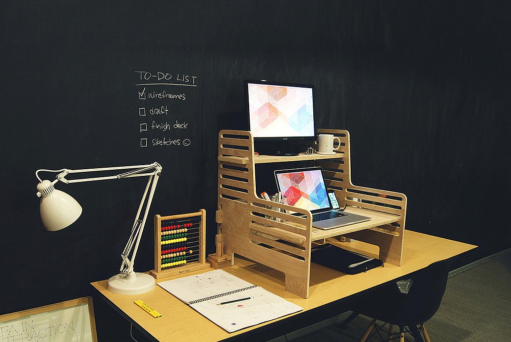 Regular desk turned into a standing desk with creativity