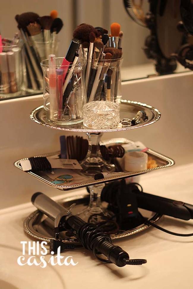 Use a tiered tray to store makeup and hair accessories