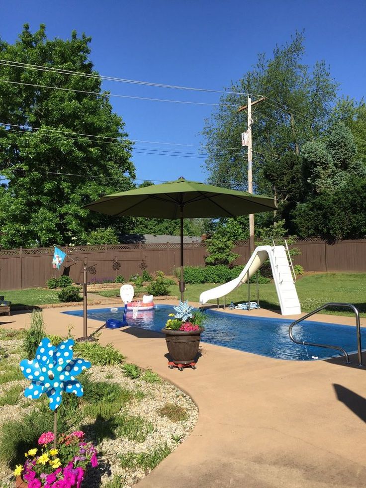 Pool deck with umbrella planter