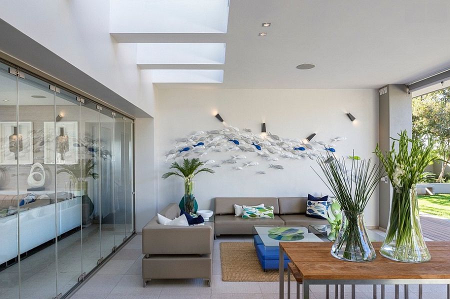 3D fish wall art for the sunroom with skylight [Design: C7 Architects]
