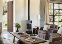 A-woodstove-for-the-living-area-with-a-muted-color-palette-217x155