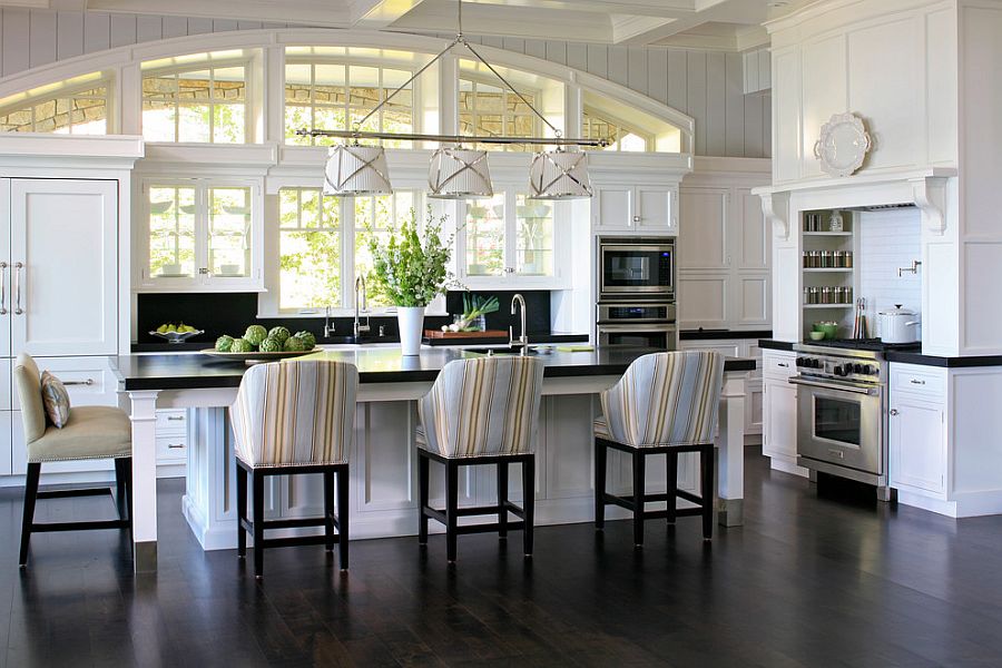 Add those stripes to the kitchen with smashing bar chairs [From: James Yochum Photography]