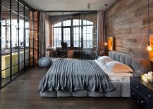 Bachelor-bedroom-inside-loft-apartment-with-bedside-pendants-wooden-and-glass-walls-217x155