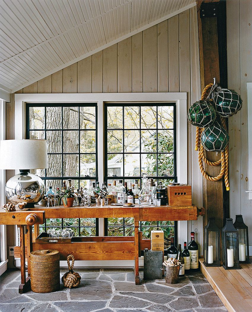 Beautiful bar on the rustic porch is all geared up for fun fall parties [Design: Thom Filicia]