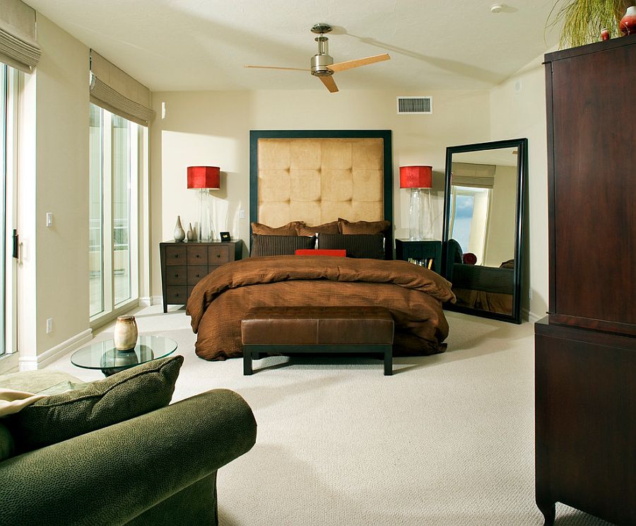 Bedside lamps with bright red shades steals the show here [Design: suzanne lawson design]