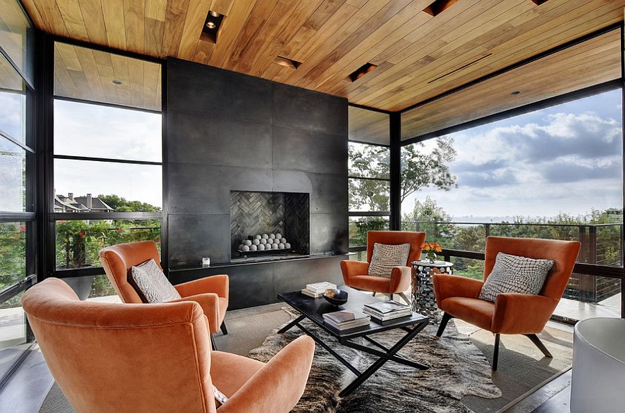 Black fireplace and wooden roof for the spacious sunroom