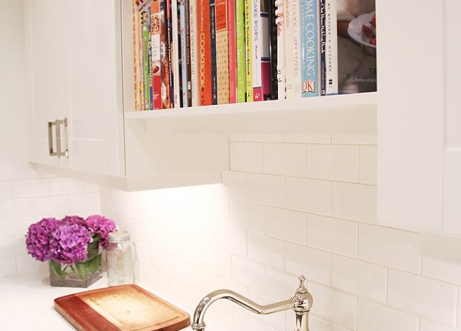 15 Unique Kitchen Ideas For Storing Cookbooks Decoist   Bookshelf Directly Above Kitchen Sink 650x467 