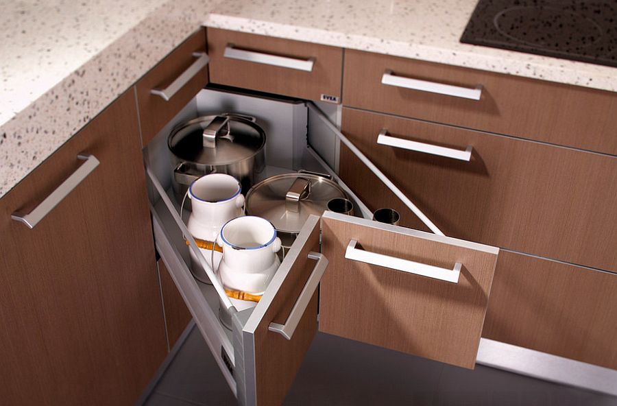 Butterfly corner drawers in the kitchen help tuck away those extra pots and pans