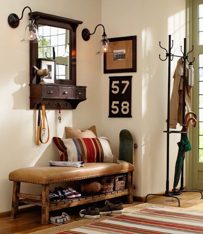 Caden leather bench used for extra shoe storage