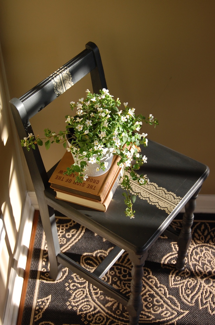 Chair dressed up with gold lace design