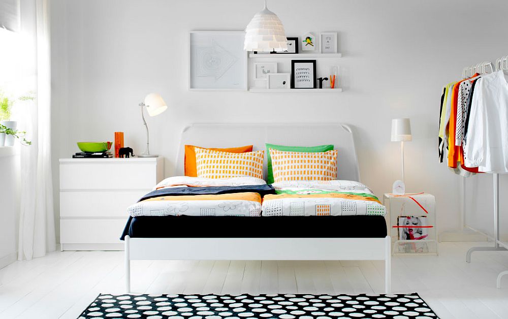 Chic bedroom with pops of color, sleek DUKEN bed and stylish IKEA side table
