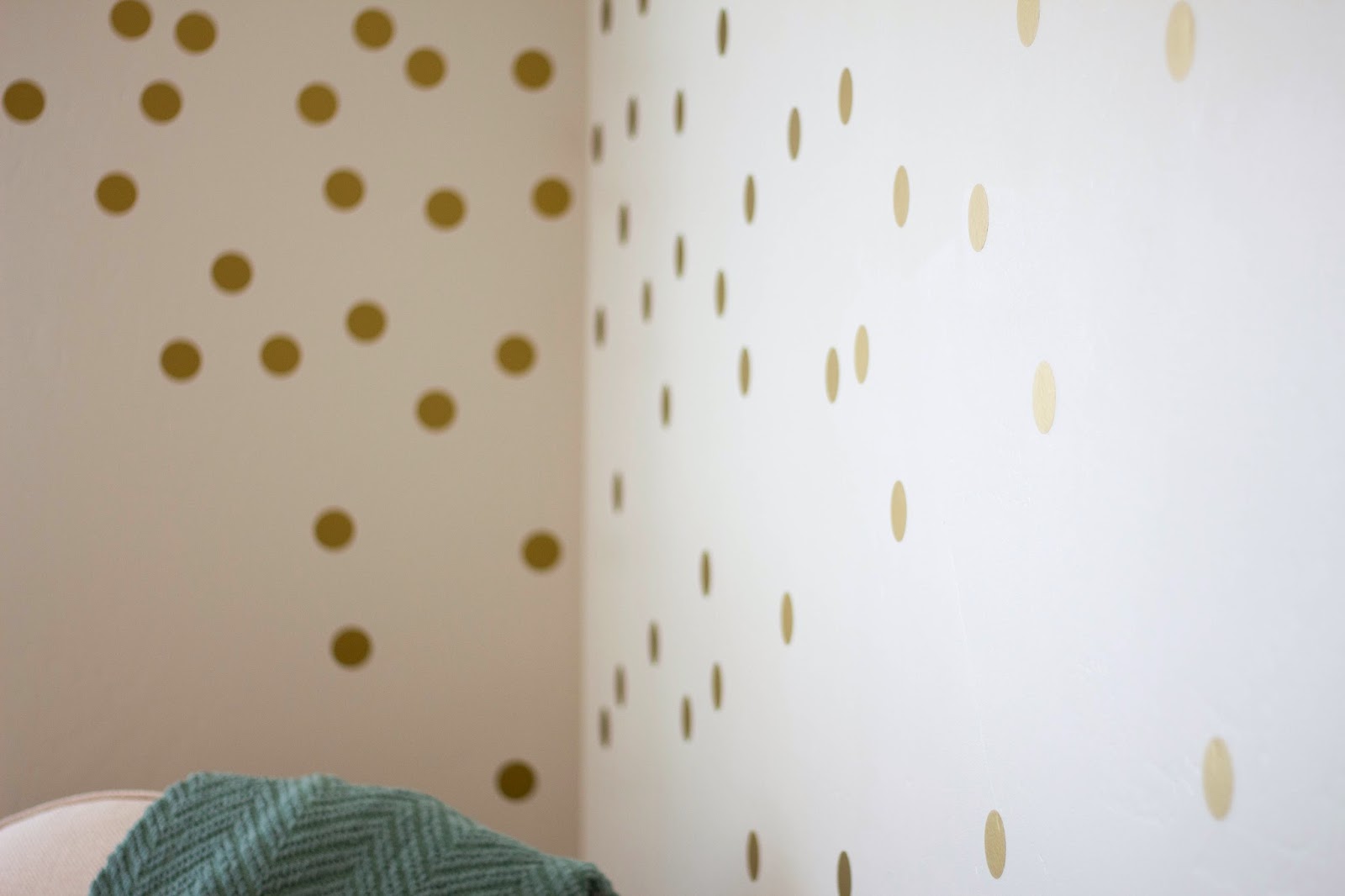 Close up of gold polka dot wall decals