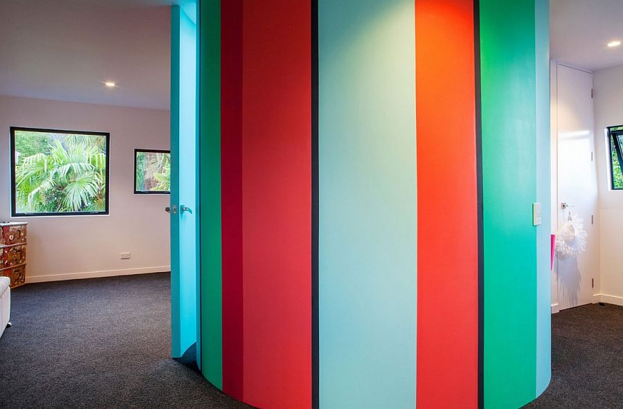 Colorful tube structure acts as the kids' bathroom