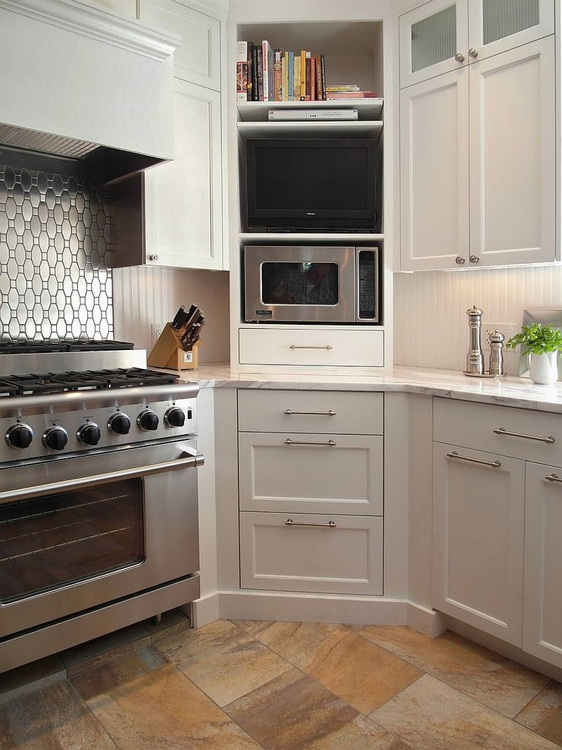 Corner microwave cabinet in the kitchen with shelves above and drawers below [Design: Donna DuFresne Interior Design]