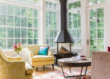 Cozy-yellow-chairs-and-freestanding-fireplace-for-the-sunroom-family-room-217x155