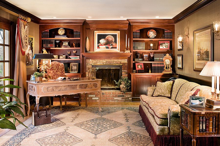 Custom-built bookcases surround the fireplace in this beautiful home office