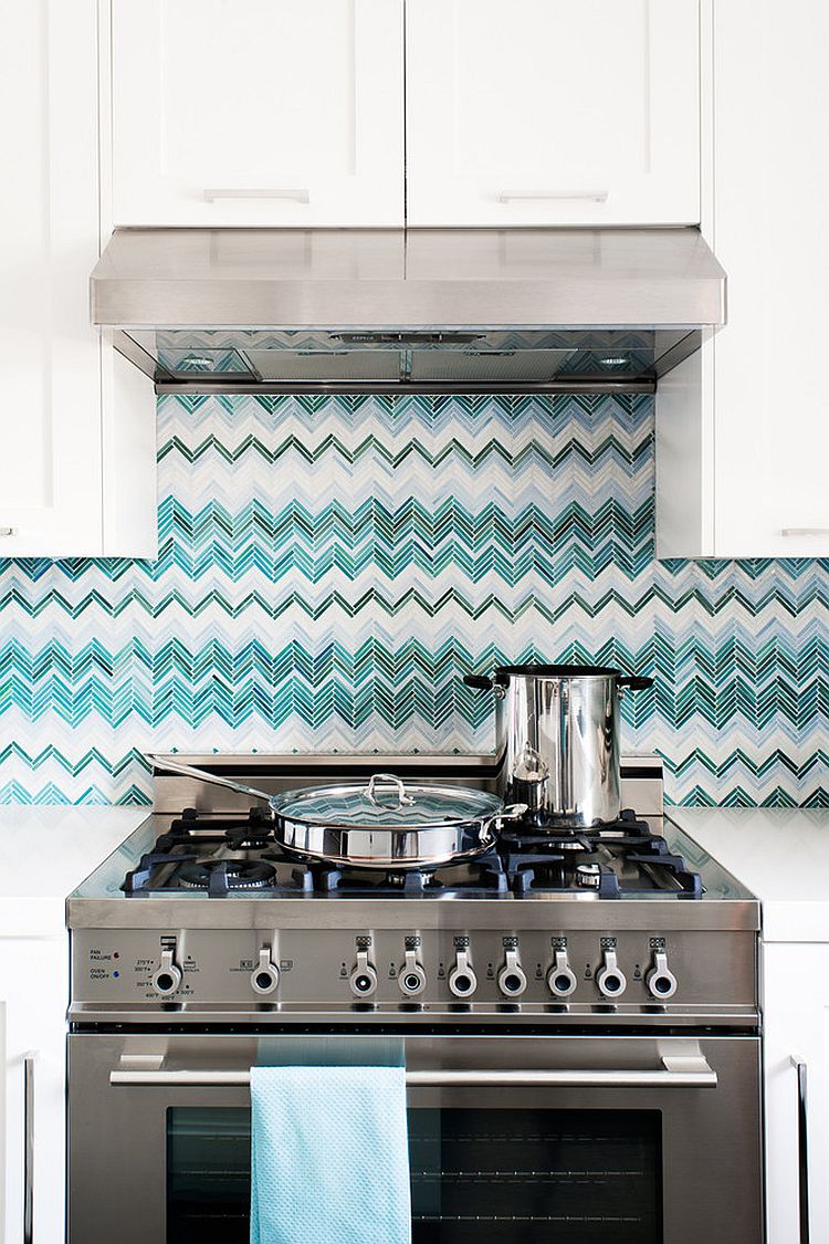 Custom designed glass tile backsplash with chevron pattern