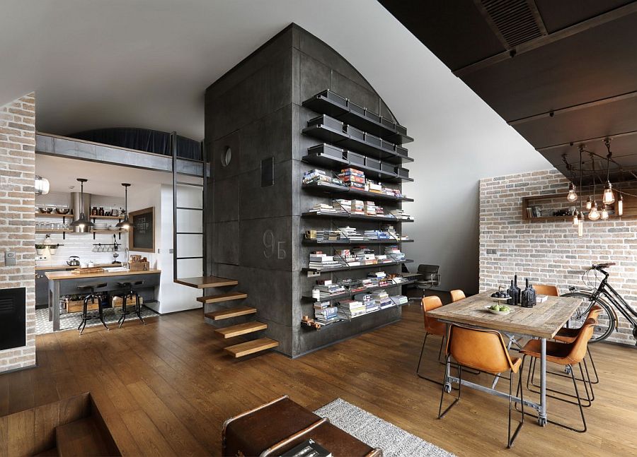 Dark cube at the heart of the living room contains elevator shaft and bathroom