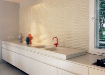 Decorative-ceramic-tiled-backdrop-in-the-contemporary-kitchen-in-white-217x155