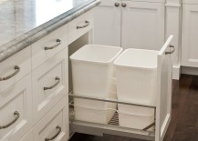 Double-garbage-cans-hidden-in-white-cabinetry-217x155