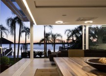 Ergonomic-ambient-lighting-brings-warmth-to-the-stylish-pool-house-217x155