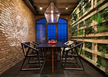 Fabulous-dining-room-of-Kyiv-bachelor-loft-with-unique-green-wall-217x155