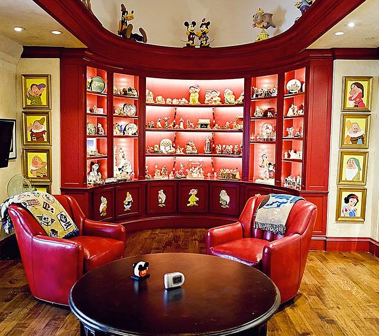 Family room in Dallas home proudly displays Disney Collectibles [Design: Interior Concepts]