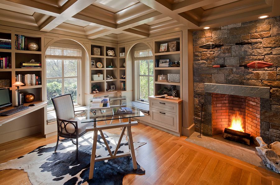 Fireplace surround in Adirondack stone turns it into the focal point of this lovely home office [Design: Polhemus Savery DaSilva]