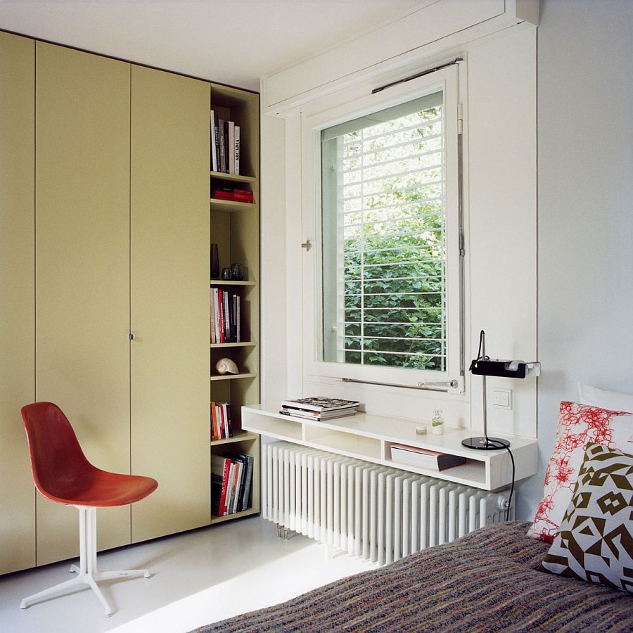 Floating bedside table above the sleek radiator