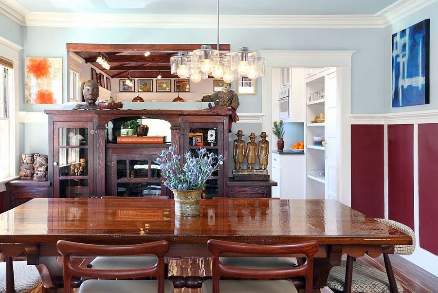 Formal dining area with world travel souvenirs in the backdrop