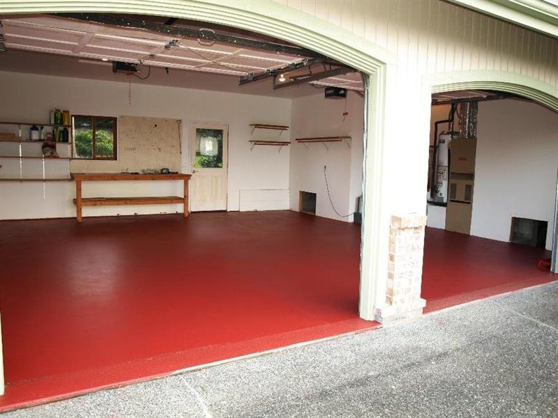 Garage with a bold red floor