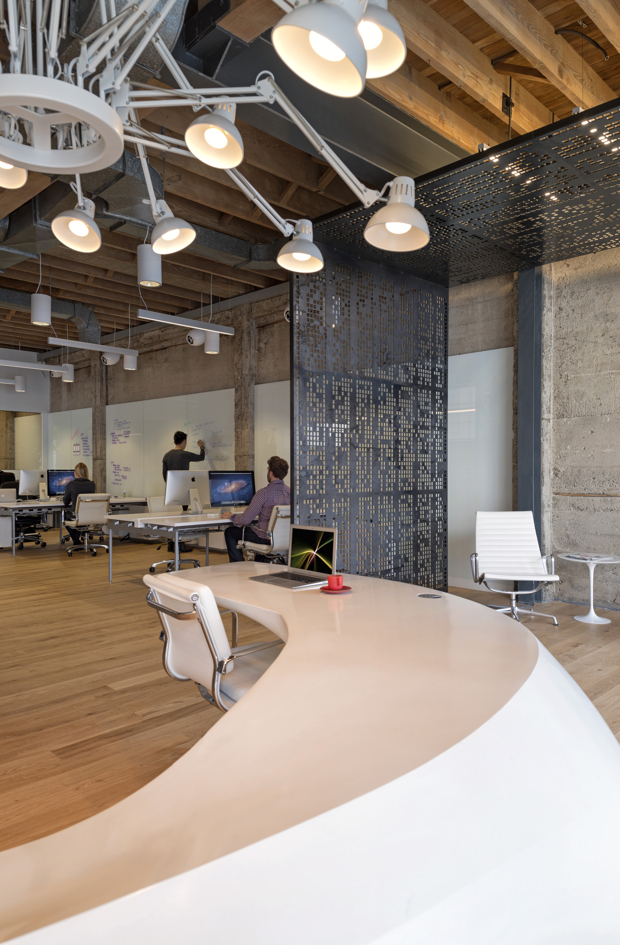 Giant Pixel reception desk with office view