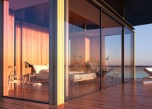 Glass-walls-of-floating-house-maximize-surrounding-views-217x155