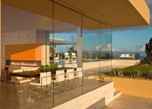 Glass-walls-offer-seamless-connectivity-with-the-outdoor-spaces-217x155