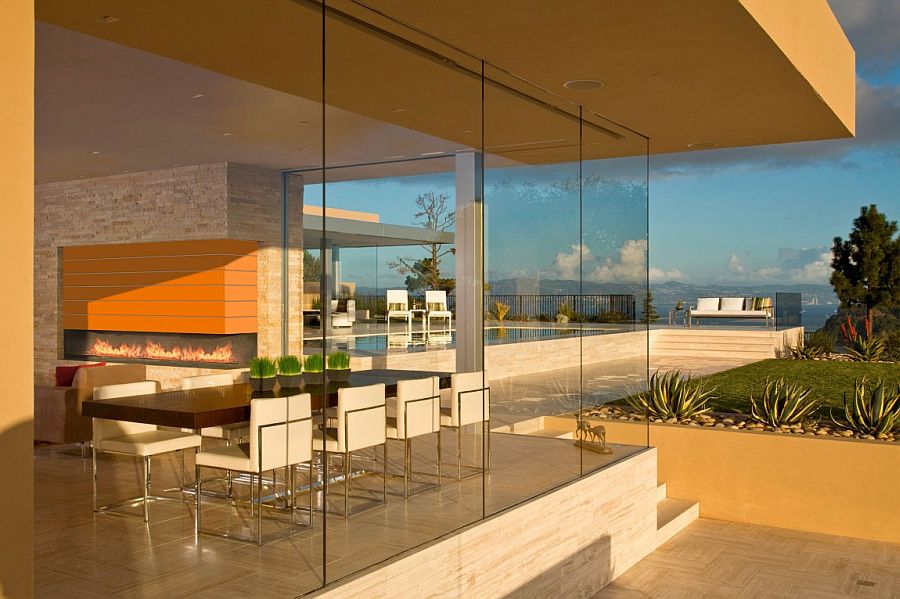 Glass walls offer seamless connectivity with the outdoor spaces