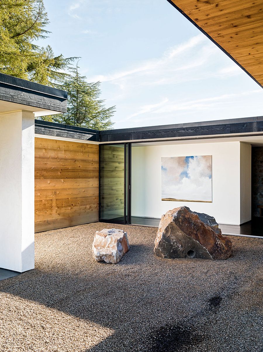 Gravel and stone courtyard next to bedroom