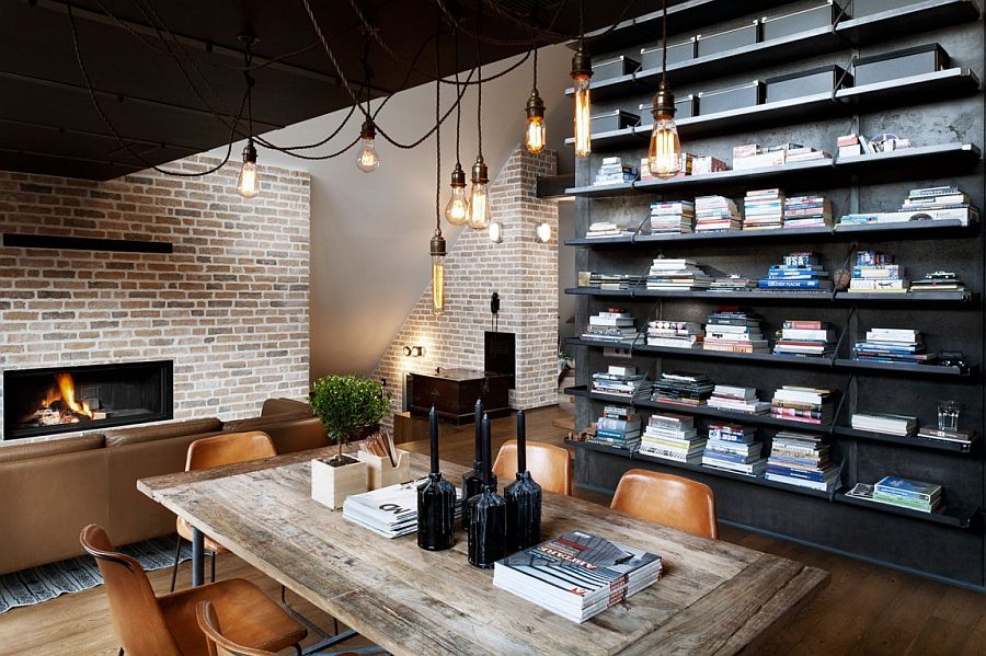 Industrial style bulb lighting above the small dining space