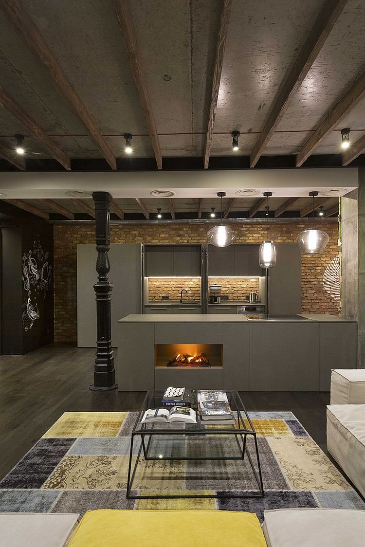 Kitchen and living area of the loft apartment with a hint of yellow goodness